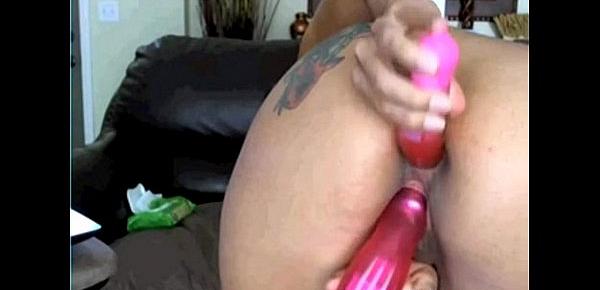  Busty brunette puts inside her pussy different dildos